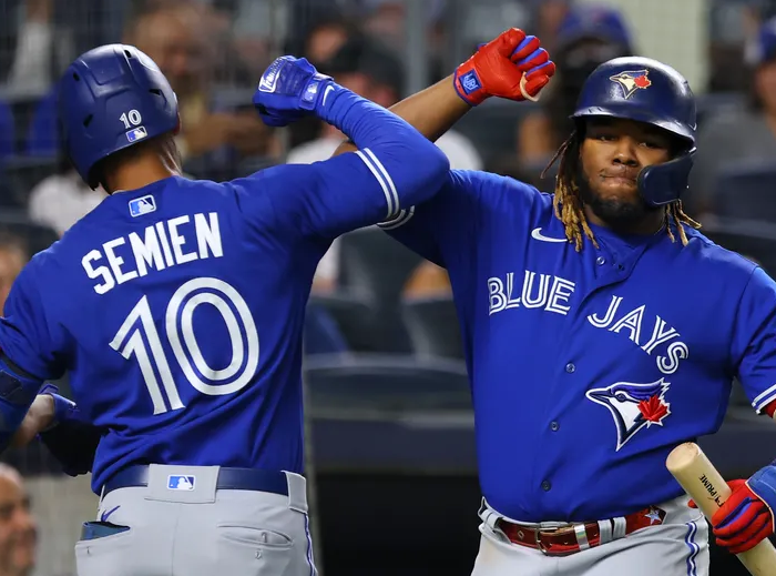 Blue Jays' players high fiving